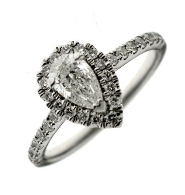 Lot 4 - Pear cut diamond halo platinum ring