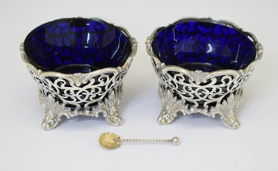 Lot 168 - Pair of Victorian silver open salts with blue glass liners
