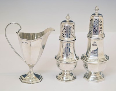 Lot 195 - Two George V baluster sugar casters, Victorian helmet cream jug