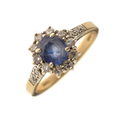 Lot 23 - Sapphire and diamond 9ct gold cluster ring