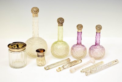 Lot 362 - Small group of 19th century and later silver capped cut glass bottles
