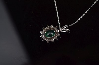 Lot 57 - Emerald and diamond cluster pendant