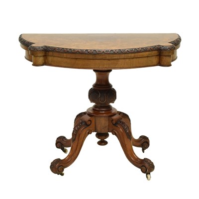 Lot 551 - Victorian walnut fold over card table