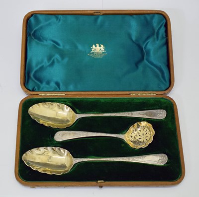 Lot 186 - Matched pair of George III serving spoons, silver sugar sifter