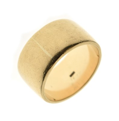 Lot 53 - Wide yellow metal wedding band, stamped 9ct