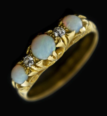 Lot 15 - Early 20th century opal and diamond 18ct gold boat head ring