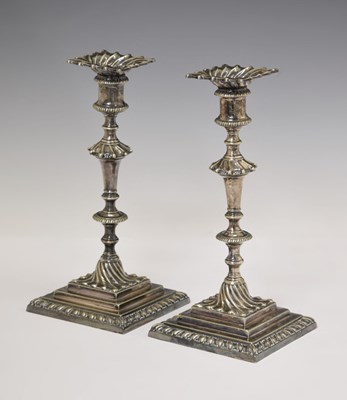 Lot Pair of 19th century silver plated candlesticks in the George II style