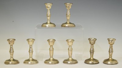 Lot 222 - Eight Elizabeth II silver candlesticks
