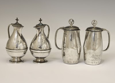 Lot Two pairs of Elizabeth II silver communion wine and water cruets