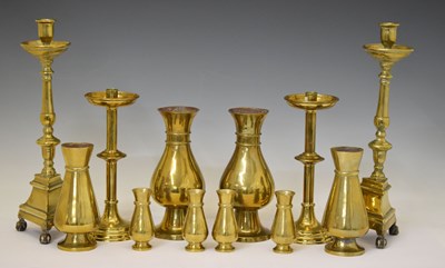 Lot 295 - Pair of 17th century style brass candlesticks, brass vases, candlestick