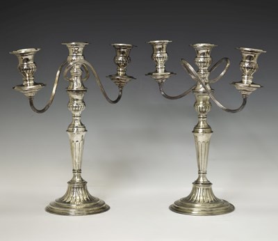 Lot Pair of 20th century Elkington silver plated twin branch, three light candelabra