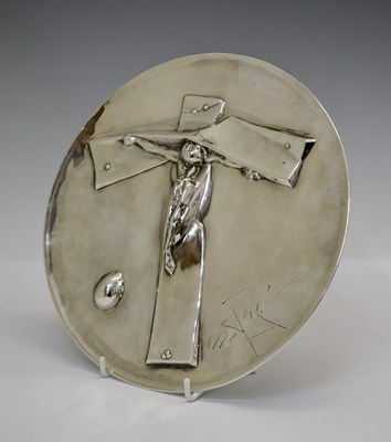 Lot After Salvador Dali (1904-89), a white metal plate depicting the "Easter Christ"