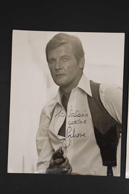 Lot 263 - Two Roger Moore (James Bond and The Saint) signed photographs