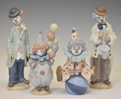 Lot 335 - Lladro - Four porcelain clown figures