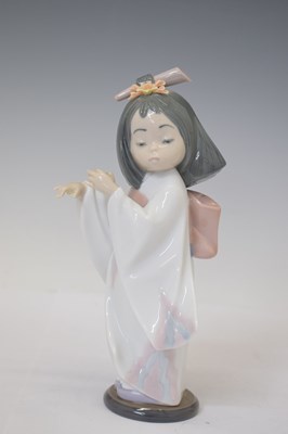 Lot 334 - Lladro - Three porcelain figures