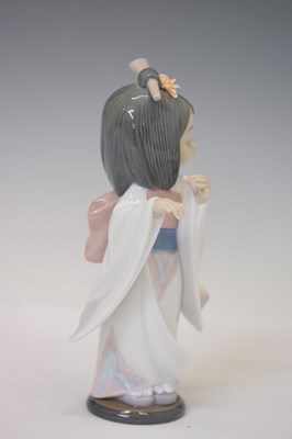 Lot 334 - Lladro - Three porcelain figures