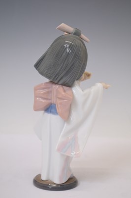 Lot 334 - Lladro - Three porcelain figures