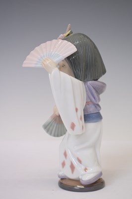 Lot 334 - Lladro - Three porcelain figures