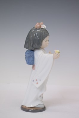 Lot 334 - Lladro - Three porcelain figures