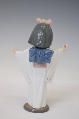 Lot 334 - Lladro - Three porcelain figures