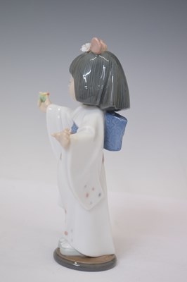 Lot 334 - Lladro - Three porcelain figures