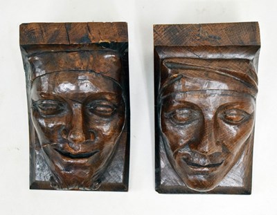 Lot 205 - Pair of carved golden oak wall brackets