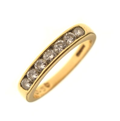 Lot 10 - Diamond 18ct gold half eternity ring