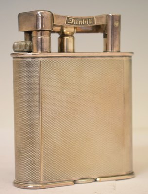 Lot 247 - Dunhill silver plated table lighter with engine turned decoration