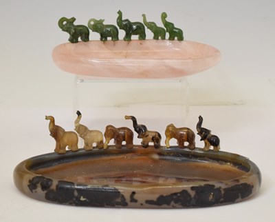 Lot 241 - Two quartz pin dishes, of oval form with parading elephants