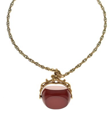 Lot 94 - 9ct gold and carnelian swivel fob seal plus unmarked yellow metal chain