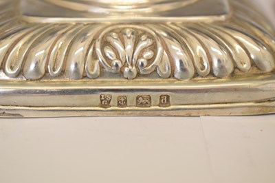 Lot 164 - Two pairs of silver candlesticks