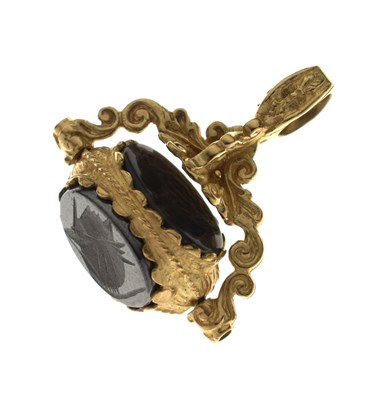 Lot 92 - Three-sided yellow metal swivel fob