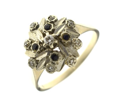 Lot 15 - Sapphire and diamond cluster dress ring