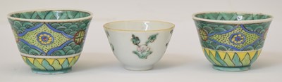 Lot 349 - Two Chinese Canton Famille Verte porcelain tea bowls, plus another smaller