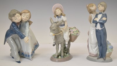 Lot 336 - Lladro - Three boxed porcelain figures