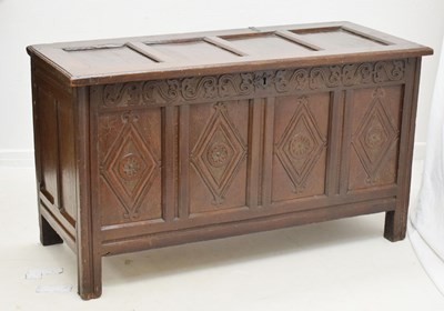 Lot 527 - Carved oak four panel coffer