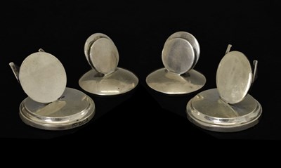 Lot Two pairs of silver menu holders of plain circular form