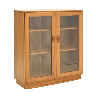 Lot 475 - Ercol - Windsor elm glazed two-door display cabinet