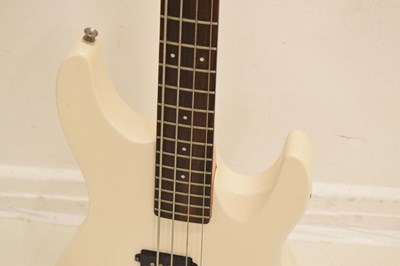 Lot 260 - Mad Axe by Aria Pro II four-string electric guitar