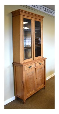 Lot 677 - Oak bookcase on cabinet