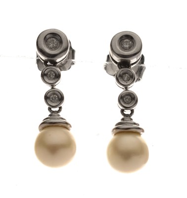 Lot 90 - Diamond and cultured pearl 18ct white gold drop earrings