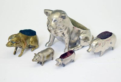 Lot 192 - Collection of base metal pig pin cushions