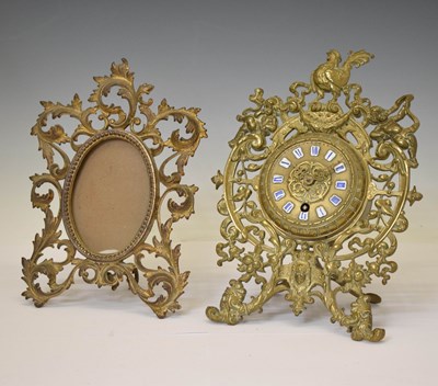 Lot 513 - French brass strut clock, plus brass frame