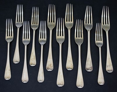 Lot 146 - Set of six George V Old English pattern table forks and dessert forks
