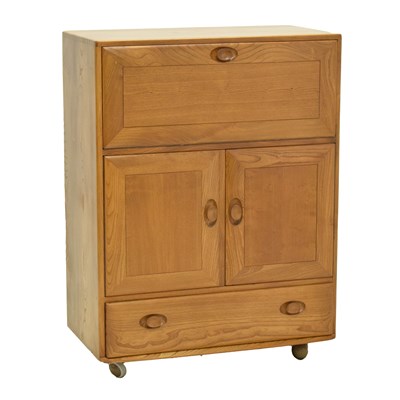Lot 472 - Ercol - Windsor elm serving / drinks cabinet