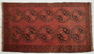 Lot 487 - Afghan wool rug