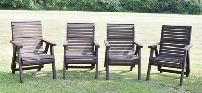Lot 544 - Set of four wooden slatted garden patio or terrace open arm chairs