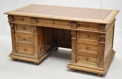Lot 533 - Mid 20th century pine desk with inset leatherette top