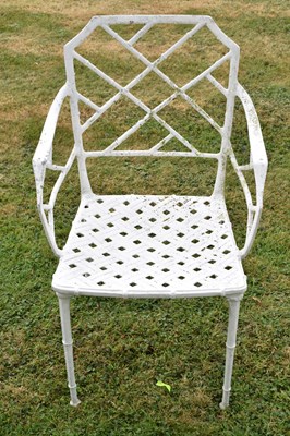 Lot 543 - White painted cast metal bamboo-effect garden / patio set