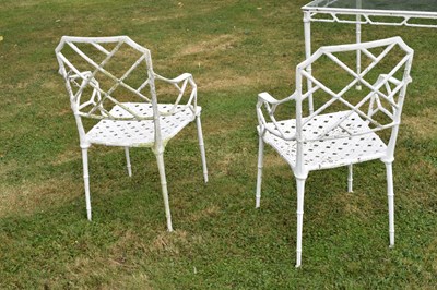 Lot 543 - White painted cast metal bamboo-effect garden / patio set